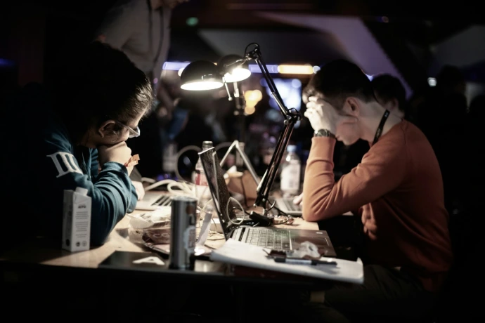 Consultant managing IFS configuration on a laptop